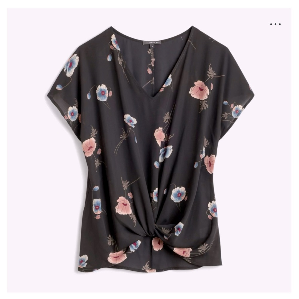 Women's V-Neck top with knot detail.